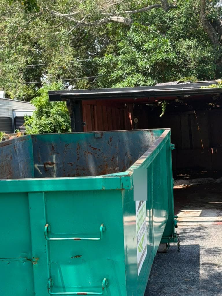 Dumpster set up at a residential property for a cleanout